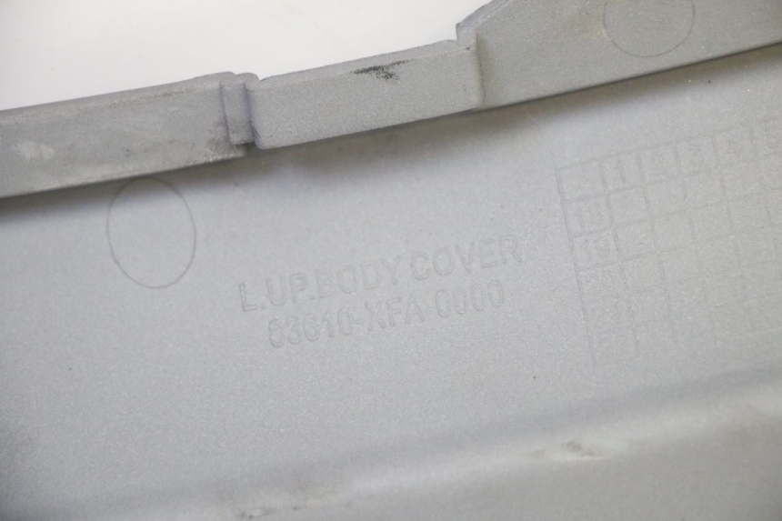 photo de LEFT UNDERSEAT COVER SYM FIDDLE 3 III 125 (2014 - 2020) - Additional view of the item