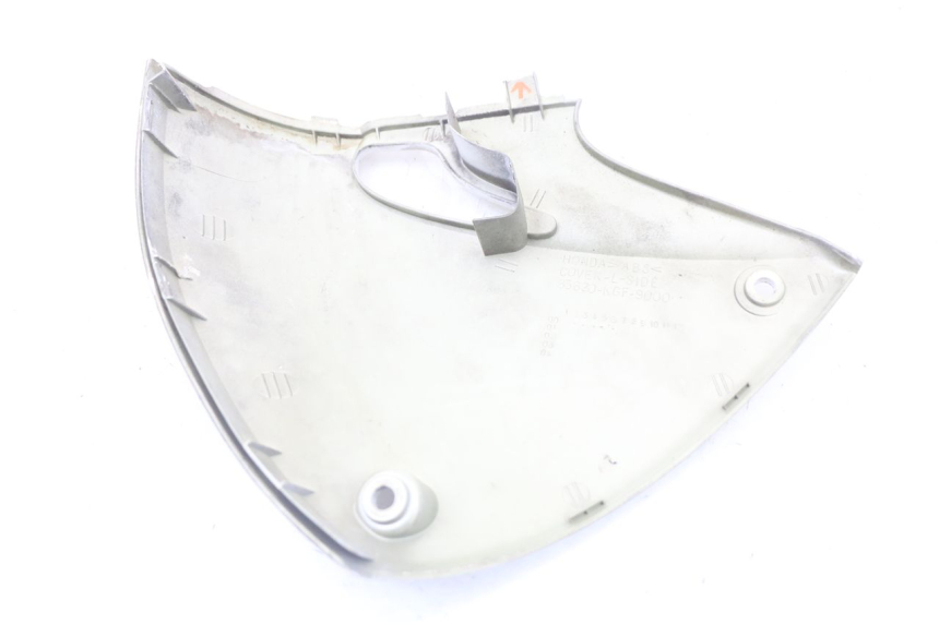 photo de LEFT UNDERSEAT PANEL HONDA NES AROBASE 125 (2000 - 2003) - Alternative perspective