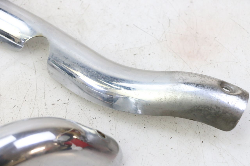 photo de Exhaust cover HYOSUNG GV AQUILA 125 (2000 - 2009) - Surface and material condition