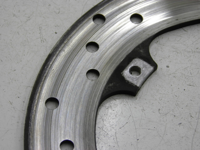 photo de REAR BRAKE DISC PIAGGIO MP3 RL 125 (2006 - 2014) - Zoom on usage condition