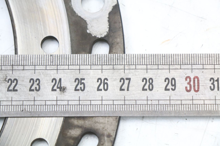 photo de Front brake disc SYM JOYRIDE EVO 125 (2009 - 2016) - Zoom on usage condition