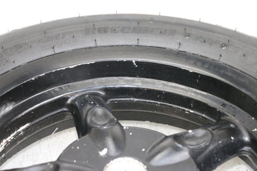 photo de REAR WHEEL RIM DAELIM A-FOUR 2T 50 (2005 - 2012) - Zoom on usage condition