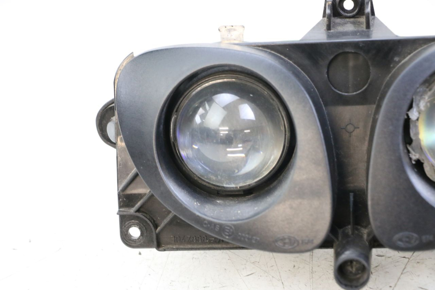 photo de HEADLIGHT PEUGEOT TKR TREKKER FURIOUS 50 (2005 - 2014) - Surface and material condition