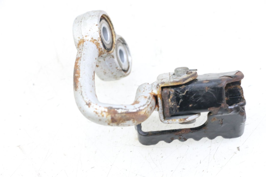 photo de Front right footrest bracket HYOSUNG XRX 125 (2000 - 2008) - Zoom on usage condition